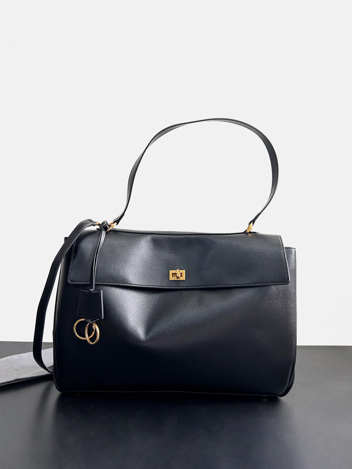 Chain Strap Leather Crossbody Bag – Elegant Lock Closure