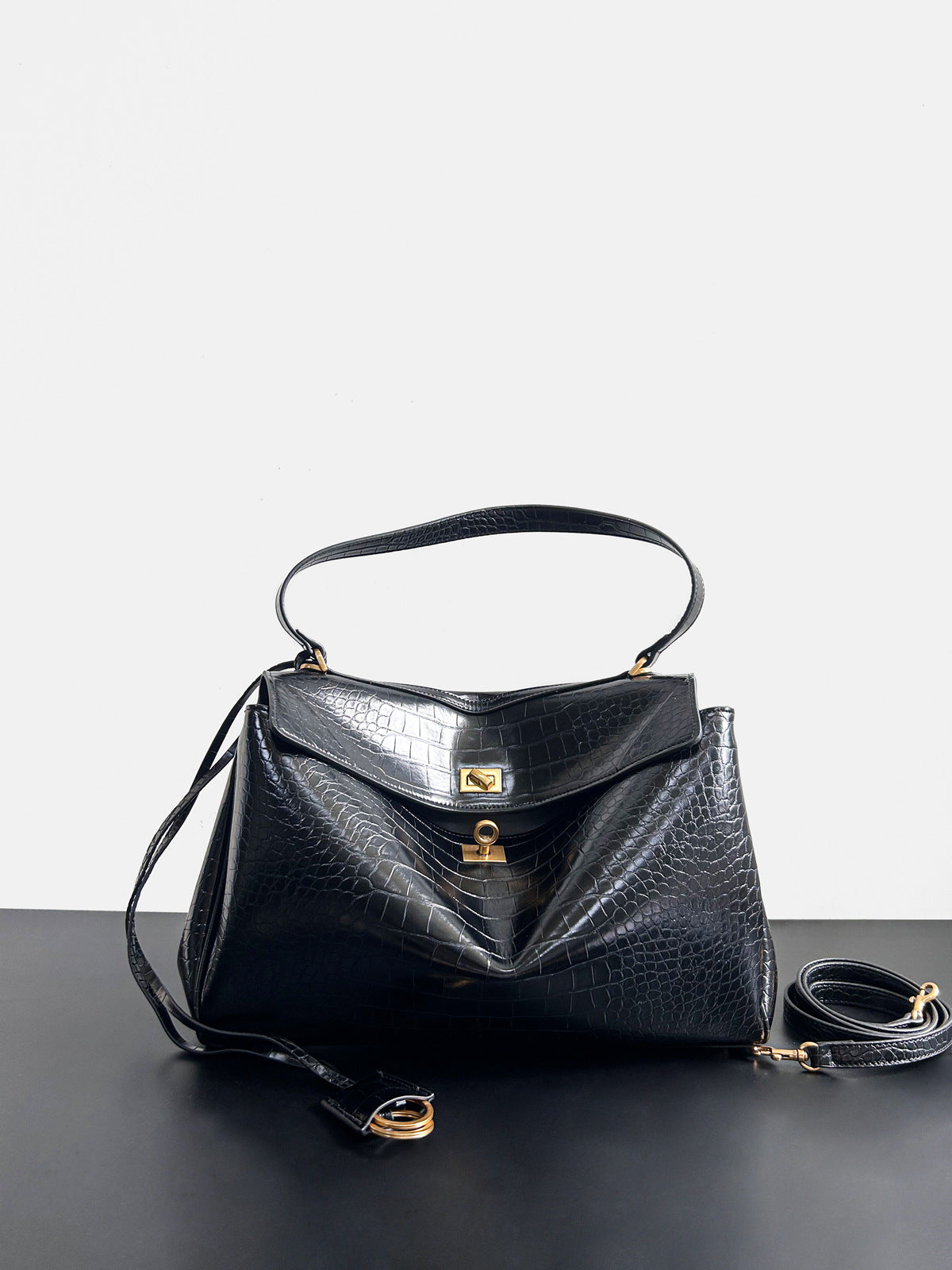 Chain Strap Leather Crossbody Bag – Elegant Lock Closure